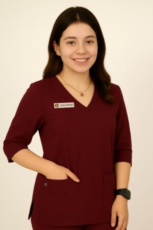 Basic women's scrub suit in light color featuring V-neckline top, quarter sleeves, and pajama-style trousers, designed for medical professionals.Comfortable & Affordable OT Wear