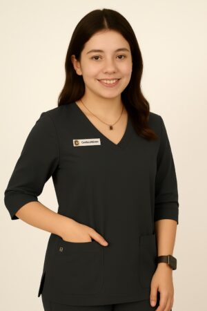 Basic women's scrub suit in light color featuring V-neckline top, quarter sleeves, and pajama-style trousers, designed for medical professionals.Comfortable & Affordable OT Wear