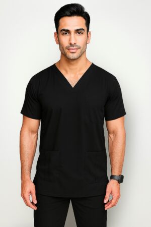 Affordable high-quality Prince men’s scrub in navy blue with V-neck and multiple pockets, modeled by a male doctor, ideal for medical professionals in Pakistan. Men's Scrub in Pakistan