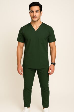 Male model wearing slim fit navy medical scrub suit with V-neck top and matching tapered pants.