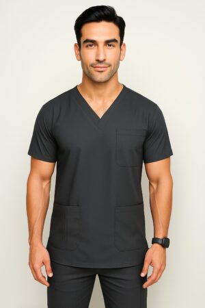 Affordable high-quality Prince men’s scrub in navy blue with V-neck and multiple pockets, modeled by a male doctor, ideal for medical professionals in Pakistan. Men's Scrub in Pakistan